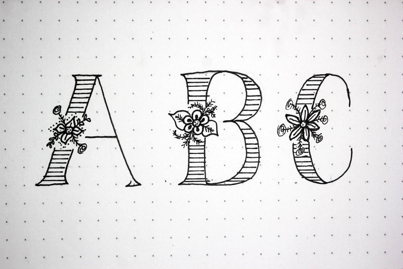 Cómo dibujar letras con flores en el medio o lettering de flores - Lettering